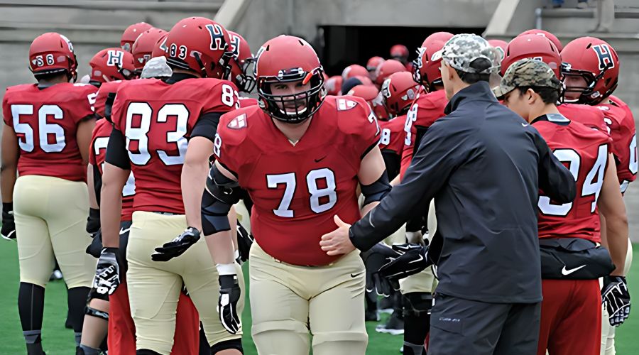 Outside linebacker Cole Toner ’16 (center) enters the stadium before the Nov. 14, 2015 game against Penn. Toner has been drafted by the Arizona Cardinals. File photo by Jon Chase/Harvard Staff Photographer
